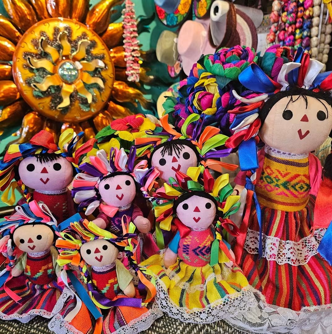 Traditional Mexican rag dolls with colorful ribbon hair