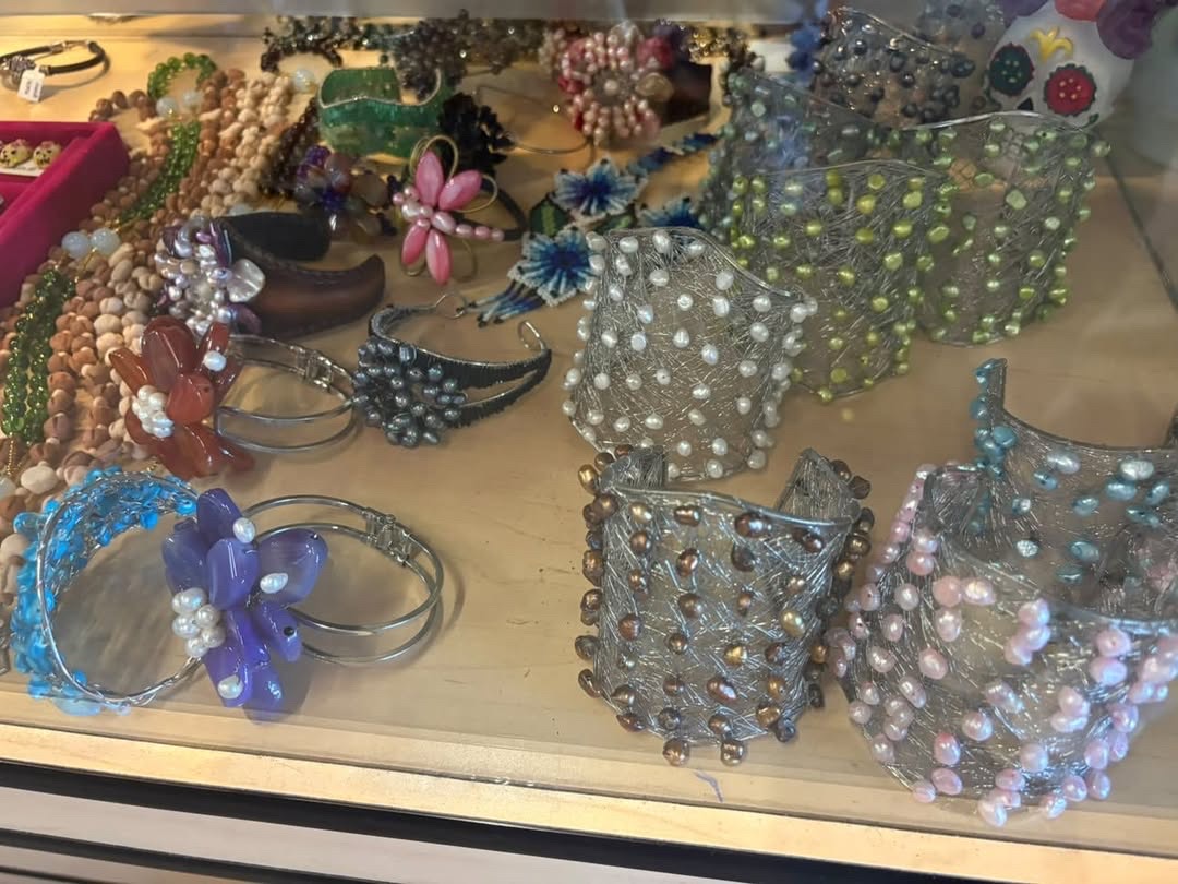 Handmade wire-wrapped cuff bracelets with beads and flowers